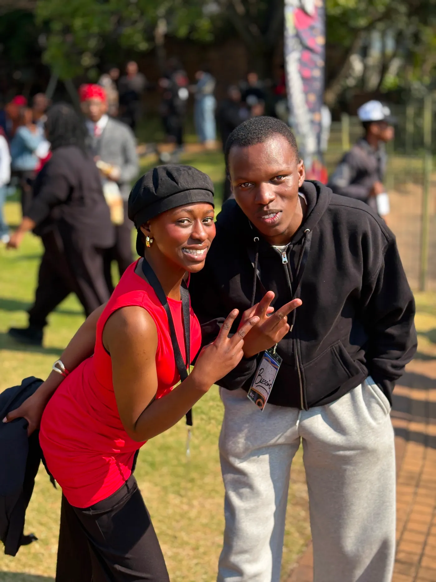 Blessing is standing with Thina